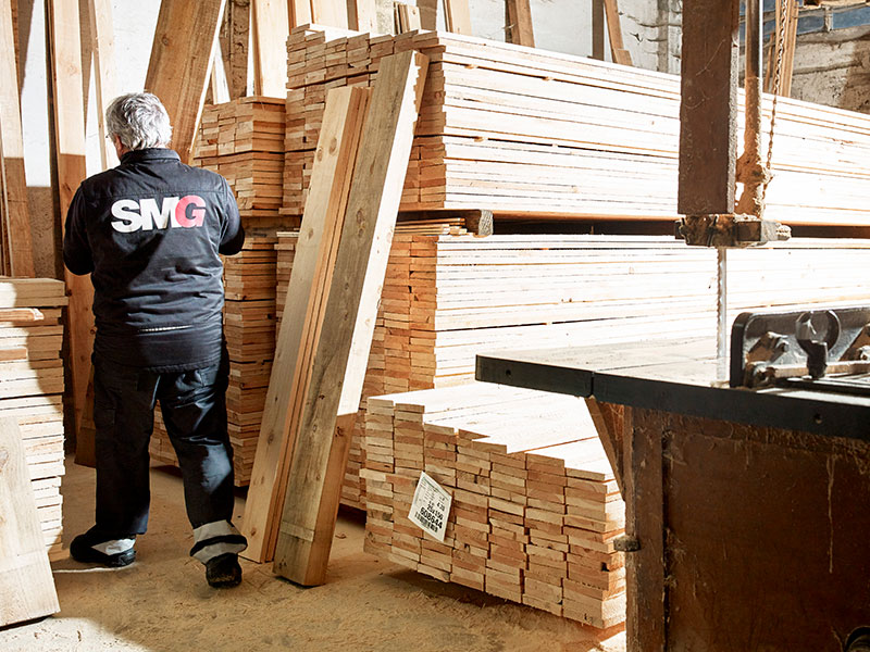 Crane moving a big object in a pavilion