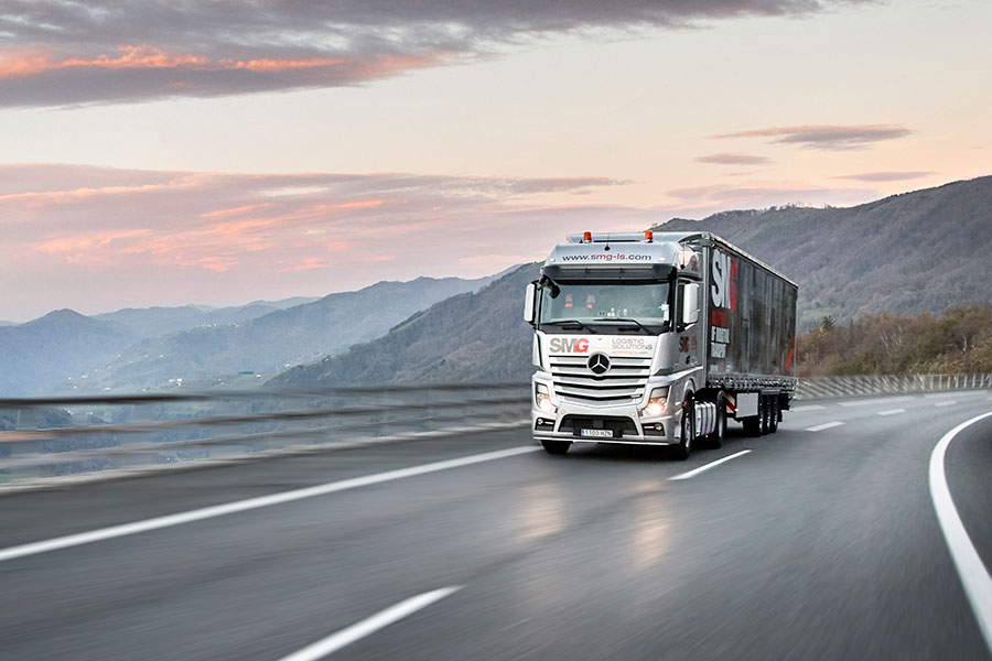 SMG truck parked alongside a pavilion